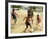 An Australian Soldier Plays with Displaced East Timorese Children-null-Framed Photographic Print