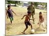 An Australian Soldier Plays with Displaced East Timorese Children-null-Mounted Photographic Print