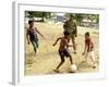 An Australian Soldier Plays with Displaced East Timorese Children-null-Framed Photographic Print