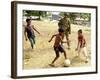 An Australian Soldier Plays with Displaced East Timorese Children-null-Framed Photographic Print