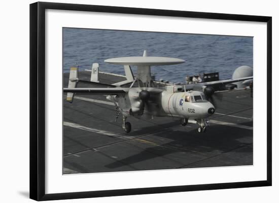 An E-2C Hawkeye Lands Aboard the Aircraft Carrier USS Nimitz-null-Framed Photographic Print