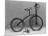 An Early Bicycle-null-Mounted Photographic Print