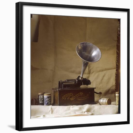 An Early Edison Phonograph Using Grooved Wax Cylinders Shown Beside the Instrument-null-Framed Photographic Print