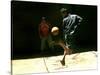 An Egyptian Boy Shows off His Ball Skill as He Plays Soccer with a Friend on the Steets of Cairo-null-Stretched Canvas