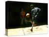 An Egyptian Boy Shows off His Ball Skill as He Plays Soccer with a Friend on the Steets of Cairo-null-Stretched Canvas