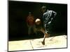 An Egyptian Boy Shows off His Ball Skill as He Plays Soccer with a Friend on the Steets of Cairo-null-Mounted Photographic Print