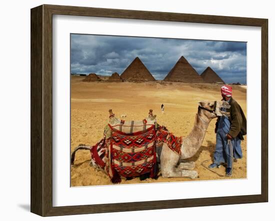 An Egyptian Man Rests His Camel Waiting for Locals and Tourists to Rent It-null-Framed Premium Photographic Print