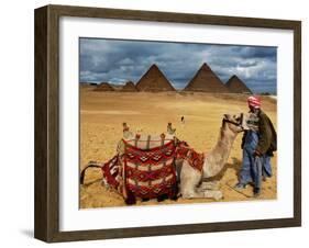 An Egyptian Man Rests His Camel Waiting for Locals and Tourists to Rent It-null-Framed Premium Photographic Print