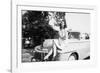 An Eighteen Year Old Woman Poses on the Hood Her Car, Ca. 1947-null-Framed Photographic Print