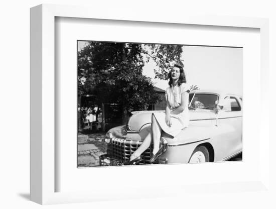 An Eighteen Year Old Woman Poses on the Hood Her Car, Ca. 1947-null-Framed Photographic Print