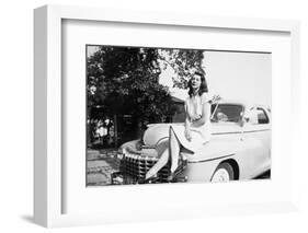 An Eighteen Year Old Woman Poses on the Hood Her Car, Ca. 1947-null-Framed Photographic Print