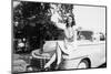 An Eighteen Year Old Woman Poses on the Hood Her Car, Ca. 1947-null-Mounted Photographic Print