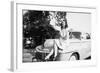 An Eighteen Year Old Woman Poses on the Hood Her Car, Ca. 1947-null-Framed Photographic Print