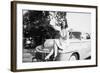 An Eighteen Year Old Woman Poses on the Hood Her Car, Ca. 1947-null-Framed Photographic Print