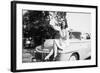 An Eighteen Year Old Woman Poses on the Hood Her Car, Ca. 1947-null-Framed Photographic Print