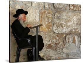 An Elderly Ultra-Orthodox Jew Prays at the Western Wall Plaza-null-Stretched Canvas