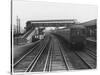 An Electric Train at Raynes Park Station Surrey England-null-Stretched Canvas