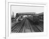 An Electric Train at Raynes Park Station Surrey England-null-Framed Art Print