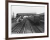 An Electric Train at Raynes Park Station Surrey England-null-Framed Art Print