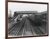 An Electric Train at Raynes Park Station Surrey England-null-Framed Art Print