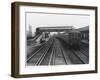 An Electric Train at Raynes Park Station Surrey England-null-Framed Art Print