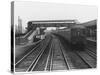 An Electric Train at Raynes Park Station Surrey England-null-Stretched Canvas