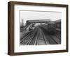 An Electric Train at Raynes Park Station Surrey England-null-Framed Art Print