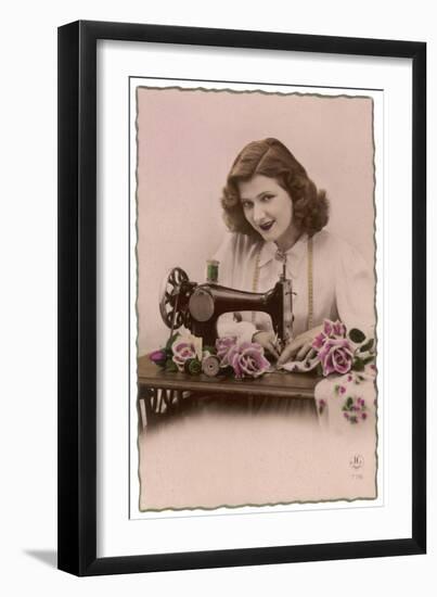 An Elegant Young Woman, Using Her Sewing Machine-null-Framed Art Print