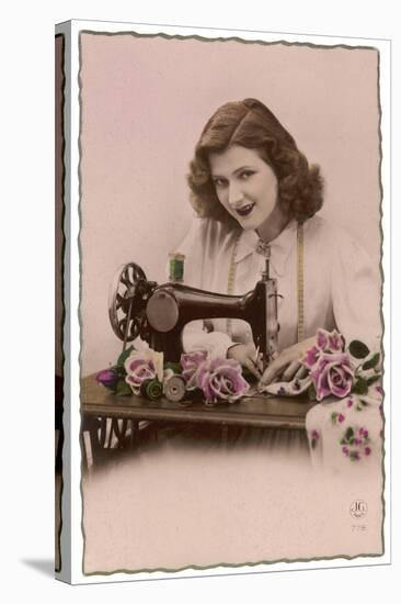 An Elegant Young Woman, Using Her Sewing Machine-null-Stretched Canvas