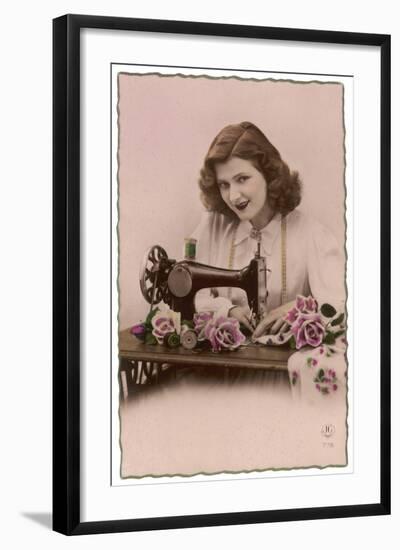 An Elegant Young Woman, Using Her Sewing Machine-null-Framed Art Print