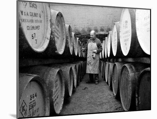 An Employee of the Knockando Whisky Distillery in Scotland, January 1972-null-Mounted Premium Photographic Print