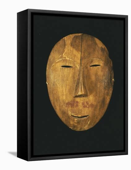 An Eskimo Wood Face Mask from Northern Alaska-null-Framed Stretched Canvas