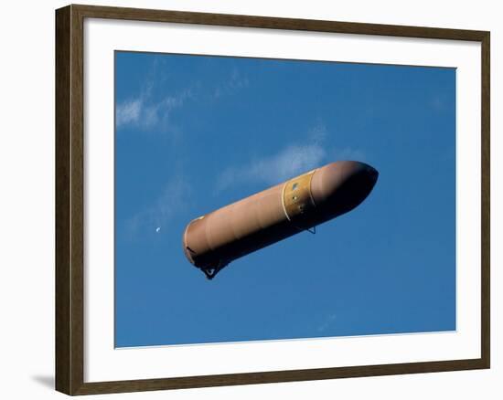 An External Fuel Tank Backdropped by a Blue And White Part of Earth-Stocktrek Images-Framed Photographic Print