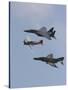 An F-15 Eagle, P-47 Thunderbolt, And F-4 Phantom Fly a Heritage Flight-Stocktrek Images-Stretched Canvas