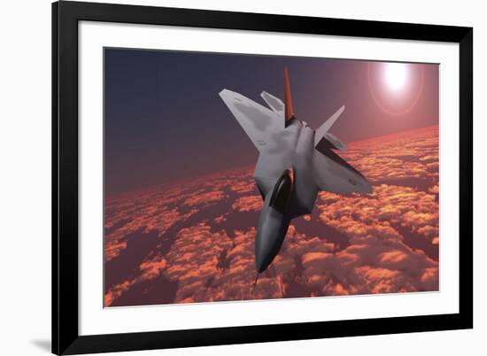 An F-22 Fighter Jet Flies at an Altitude Above the Cloud Layer on its Mission-null-Framed Art Print