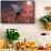 An F-22 Fighter Jet Flies at an Altitude Above the Cloud Layer on its Mission-null-Framed Stretched Canvas displayed on a wall