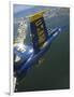 An F/A-18 Hornet of the Blue Angels Over Pensacola Beach, Florida-Stocktrek Images-Framed Photographic Print