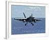 An F/A-18C Hornet Approaches the Flight Deck of the Aircraft Carrier USS Ronald Reagan-Stocktrek Images-Framed Photographic Print