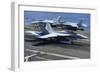 An F-A-18C Hornet Lands on the Flight Deck of USS George H.W. Bush-null-Framed Photographic Print