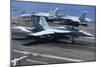 An F-A-18C Hornet Lands on the Flight Deck of USS George H.W. Bush-null-Mounted Photographic Print