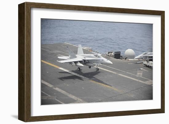 An F-A-18C Hornet Lands on the Flight Deck of USS Nimitz-null-Framed Photographic Print