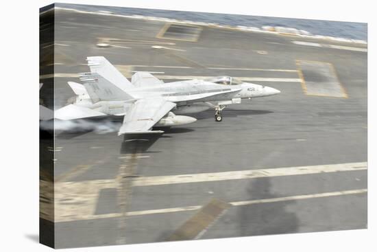 An F-A-18C Hornet Lands on the Flight Deck of USS Nimitz-null-Stretched Canvas