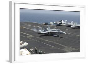 An F-A-18C Hornet Lands on the Flight Deck of USS Nimitz-null-Framed Photographic Print