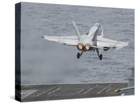 An F-A-18C Hornet Launches from the Flight Deck of USS Nimitz-null-Stretched Canvas