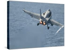 An F-A-18C Hornet Taking Off-null-Stretched Canvas