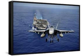 An F-A-18E Super Hornet Flying Above USS John C. Stennis-null-Framed Stretched Canvas