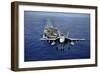 An F-A-18E Super Hornet Flying Above USS John C. Stennis-null-Framed Premium Photographic Print