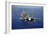 An F-A-18E Super Hornet Flying Above USS John C. Stennis-null-Framed Premium Photographic Print