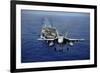 An F-A-18E Super Hornet Flying Above USS John C. Stennis-null-Framed Photographic Print