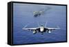 An F-A-18E Super Hornet Flying Above USS John C. Stennis-null-Framed Stretched Canvas